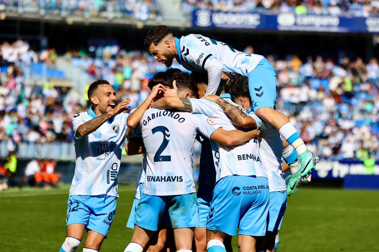 Celebración de los jugadores del Málaga CF ante el Atlético Baleares